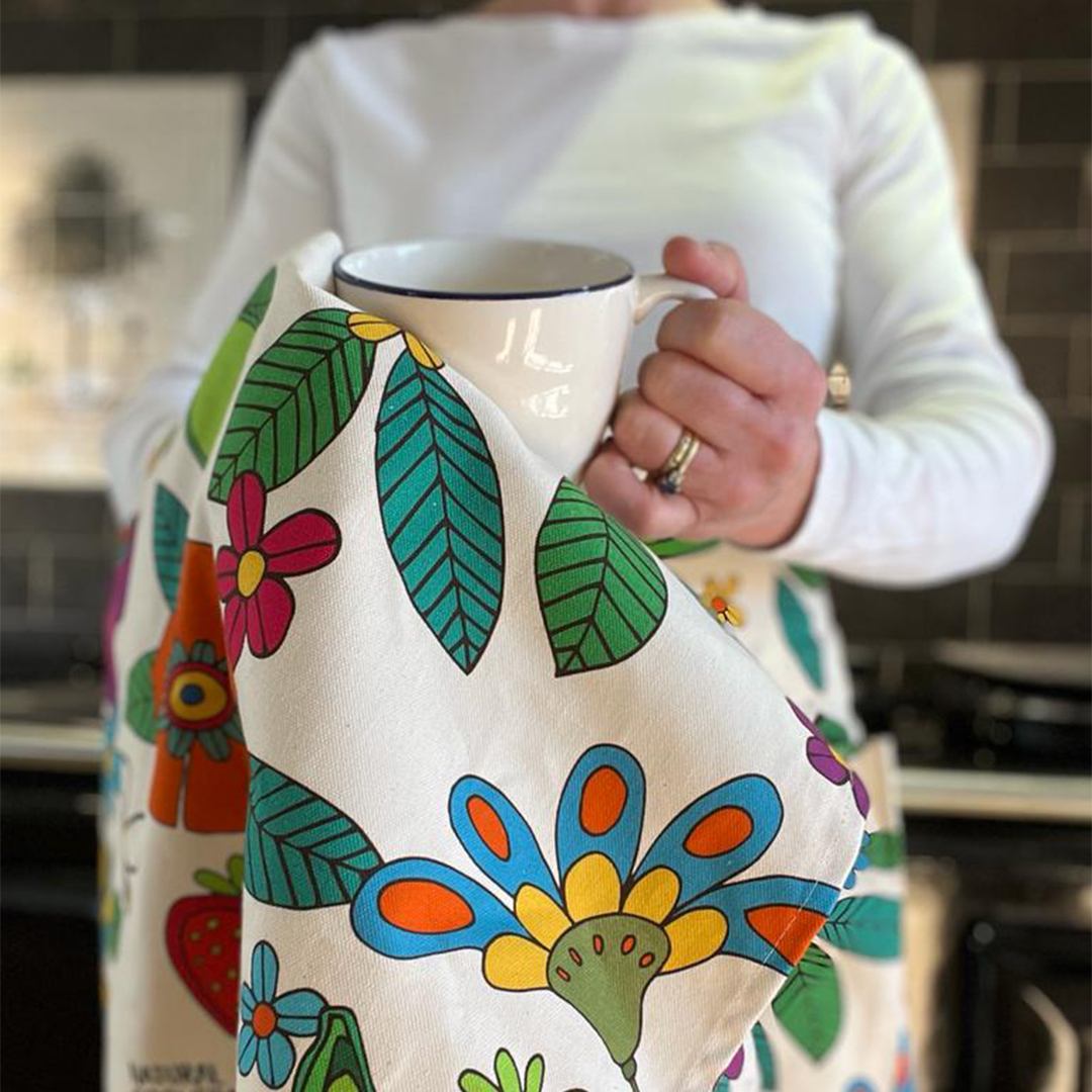 Natural Grower Flower Power tea towel showing colourful garden-inspired design