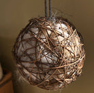 Close-up of 20cm willow nesting ball filled with natural British sheep's wool