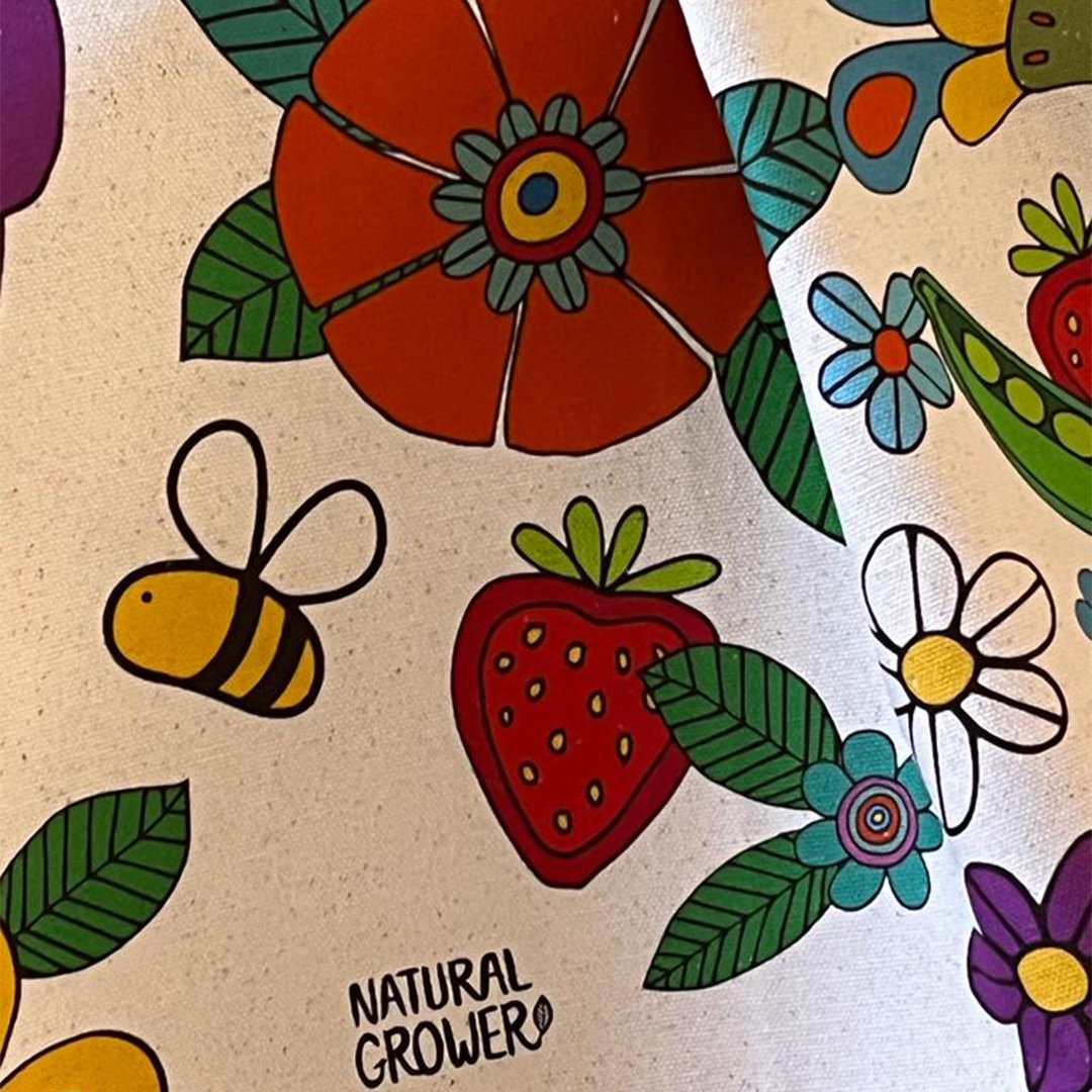 Natural Grower organic cotton tea towel with Flower Power botanical artwork