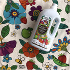 Natural Grower gardening gift set with 2L Liquid Fertiliser and Flower Power tea towel